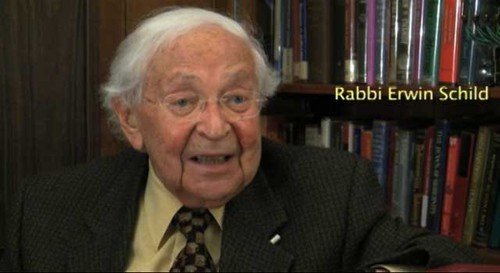 Close-up photo of Rabbi Erwin Schild being interviewed